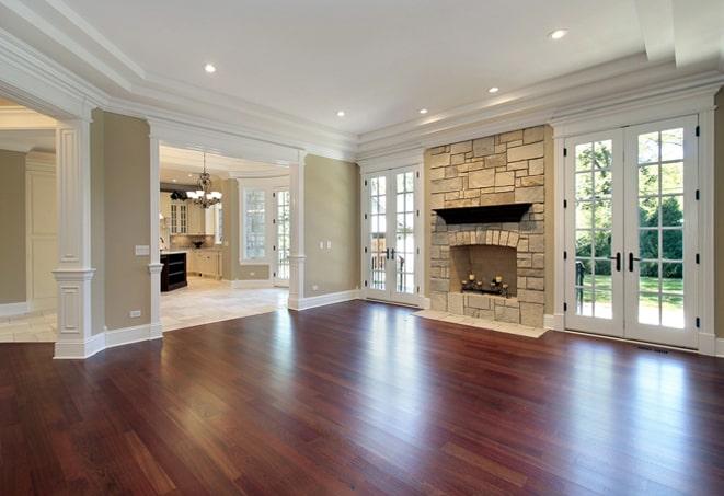 gleaming wood floors in a spacious open-concept kitchen