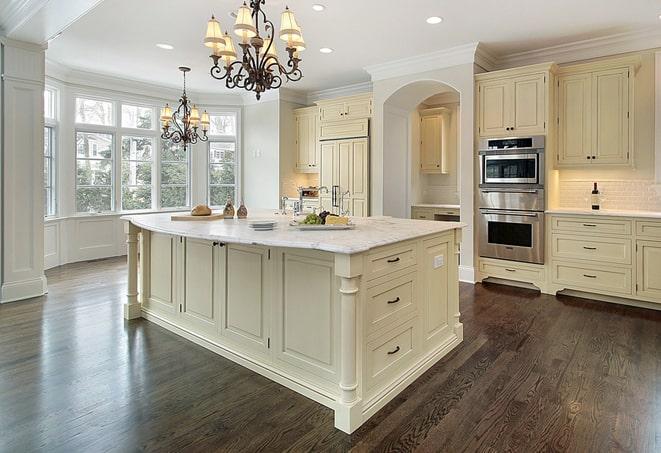 newly installed grey laminate floors in modern kitchen in Uniondale